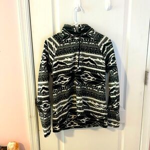 Eddie Bauer patterned jacket with 1/4 zip up. Women’s size medium.